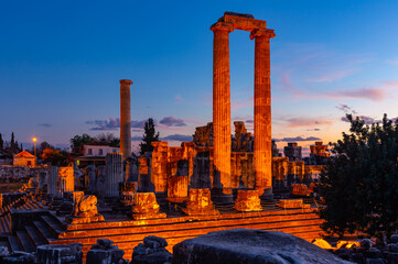 Picturesque view of illuminated remains of temple of Apollo in small Turkish town Didim at twilight