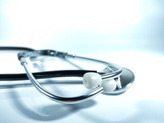 Selective focus.Blur stethoscope on white background.Medical concept.