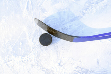 Ice hockey game on a street ice rink. Copy space. Selective focus.