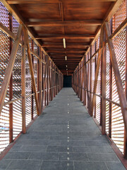 Corridor with metal fence, blacksmith path
