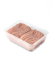 minced raw turkey meat in clean transparent recycled plastic pack side view on a white background isolated closeup. Selective focus