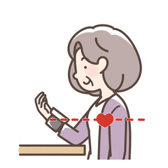 血圧をはかるおばあさん　手首式測定機