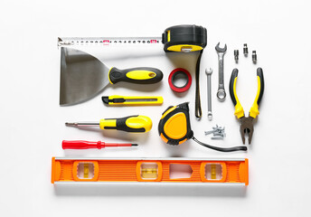 Set of construction tools on white background