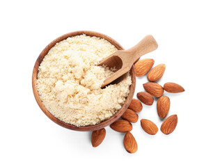 Plate and scoop with almond flour on white background