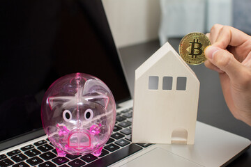 A young man tries to save a bitcoin to buy a new home