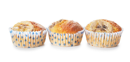 Tasty banana muffins on white background