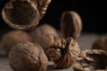 nuts in a textured shell on a vintage table background