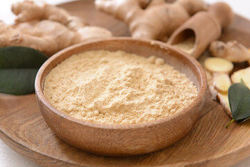Bowl with ginger powder, closeup