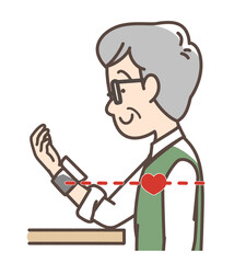 血圧をはかるおじいさん　手首式測定機