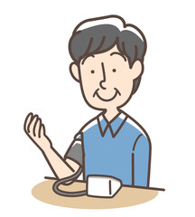 血圧を測定する男性　上腕式測定機