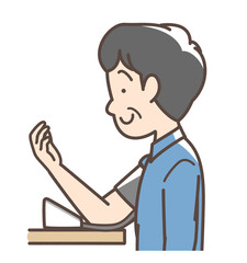 血圧を測定する男性　上腕式測定機