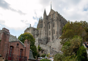 Fototapeta na wymiar Mont Saint-Michel, the monastery and village on a tidal island between Brittany and Normandy, France