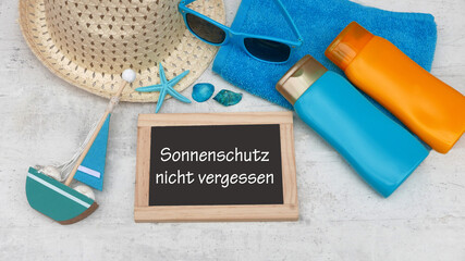 Tafel mit der Schrift Sonnenschutz nicht vergessen