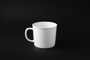 Empty cup on dark background
