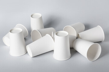 Blank takeaway cups on light background