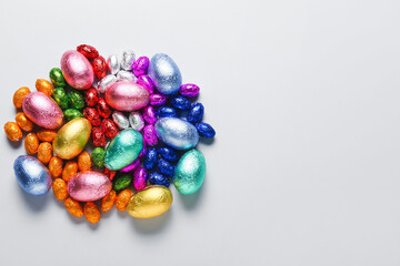 Beautiful chocolate Easter eggs on light background