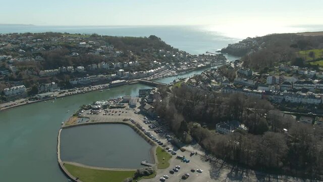 Aerial revealing east and west looe overlooking the open sea