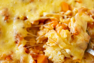 fresh baked rice with cheese and maize