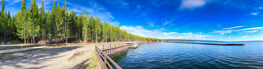 Yellowstone lake and forest on a beautiful sunny morning - Panoramic view