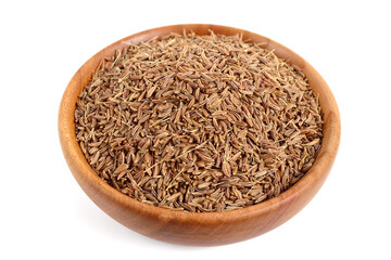 Caraway Seed (Fruit) in Wiiden Bowl. known as Meridian Fennel and Persian Cumin (Carum Carvi). Isolated on White.