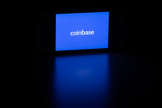 Portland, OR, USA - Feb 25, 2021: Coinbase logo is seen on a smartphone. Coinbase is a US digital currency exchange built on financial technology and based in San Francisco, California.