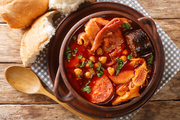 Slow Cooker Callos spanish traditional food closeup in the bowl on the table. horizontal top view...