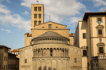 Church Santa Maria della Pieve on Piazza Grande  in Arezzo, historical city in Tuscany, Italy - obrazy, fototapety, plakaty