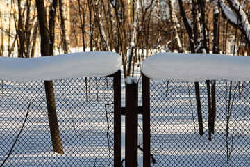 Snow on the fence - 416694052