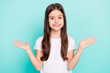 Photo of funny pretty young girl dressed white outfit showing scales empty space isolated teal color background