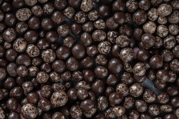 Bunch of chocolate drop candies background