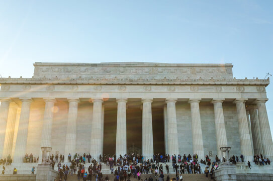 Famous Lincoln Memorial Facade and Tourists and Visitors Sitting at the Front Stairs in Washington DC, USA