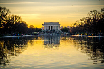 Historic Lincoln Memorial and Reflecting Pool at Sunset in Washington DC, USA. Beautiful Sky...