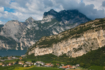 The panorama of Riva del Garda and lago di Garda lake on summer day in Trentino