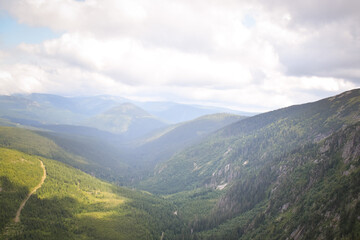 Amazing czech nature in our mountain Krkonose. Wonderful highland scenery with huge cliff. Trees are everywhere. Clean air and amazing view.