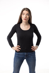 Obraz premium Isolated portrait of a surprised and shocked young woman looking at camera.
