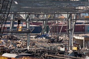 damage to warehouses and equipment at the Beirut port after an explosion in August 2020