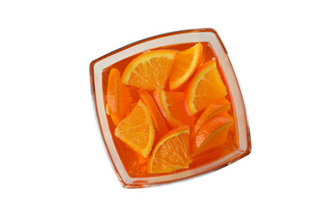 Bowl of orange jelly isolated on white background