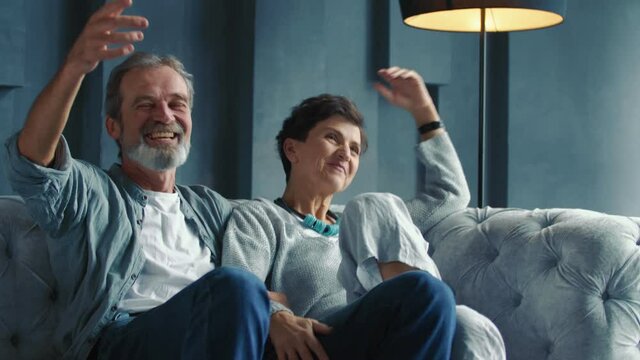 aged couple sitting on the sofa