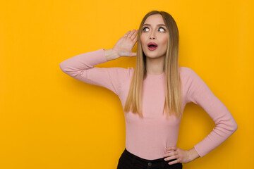 Obraz premium Surprised And Excited Woman Eavesdrops