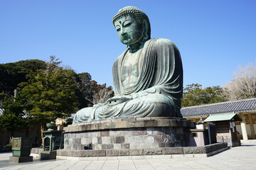 Obraz premium Monumental bronze statue of the Great Buddha in Kotokuin Temple, Kamakura, Japan - 鎌倉 大仏 高徳院 日本