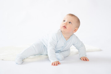Naklejka premium Charming baby looks up