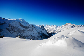 Peaks on Pralognan-la-Vanoise ski resort on sunny snow day, French Alps