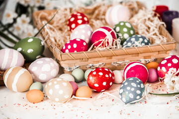 Hand painted pastel colored Easter eggs background. Happy Easter greeting card or invitation.