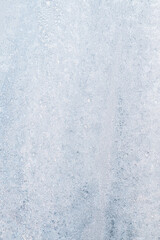 skylight ice pattern texture snowflakes and icy background. vertical