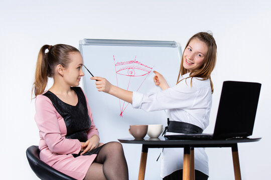 Lash and Brow. Makeup accessories. Tools for care of the brows. Eyebrows pencil. Professional makeup artist offer online course of brow style in front of laptop. Beauty e-shopping.