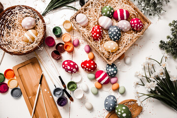 Hand painted pastel colored Easter eggs background. Happy Easter greeting card or invitation.