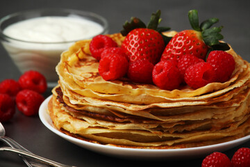 Russian cuisine national dish bliny with fresh berries