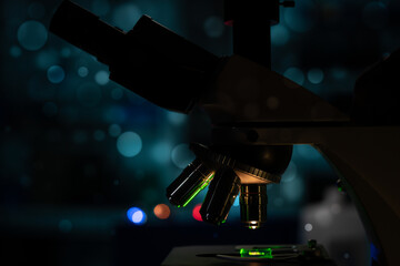 Obraz na płótnie Canvas Scientific microscope in dark laboratory