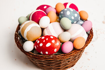 Hand painted pastel colored Easter eggs background. Happy Easter greeting card or invitation.