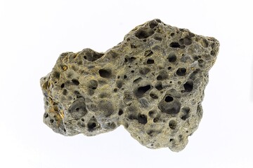 Smoke whirling around small meteorite stone